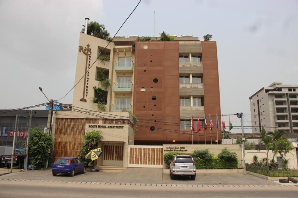 Roots Hotel Apartments Абиджан Экстерьер фото