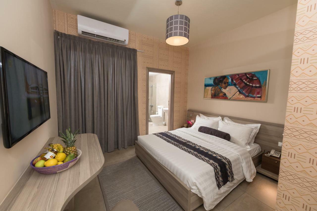 Roots Hotel Apartments Абиджан Экстерьер фото